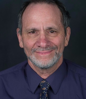 Alan-Singer-Headshot-042315-Landscape-1-704x400
